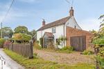 A Characterful Cottage in Little Barningham, Offering Space, Charm, and Exciting Potential